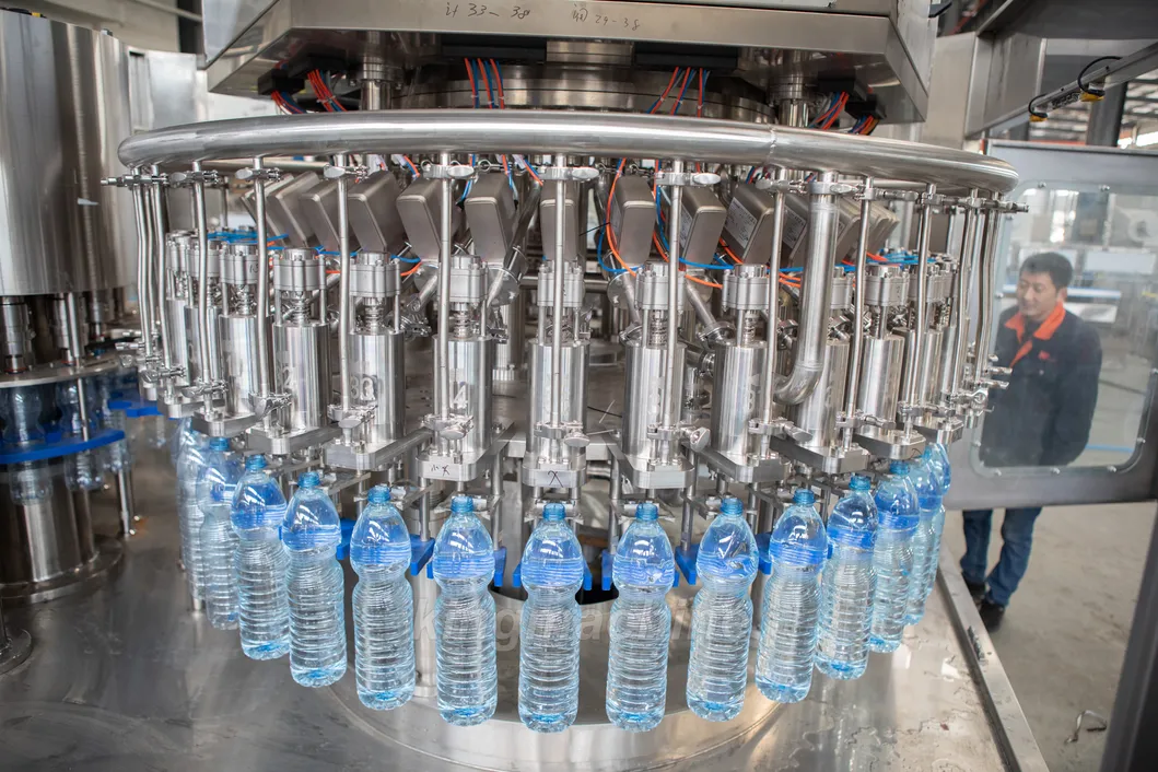 Complete Production Line for Filling Plastic Bottle Drinking Water Capacity 0, 75 Litre Packing with Plastic Packs Each Pack Contains 20 Bottles